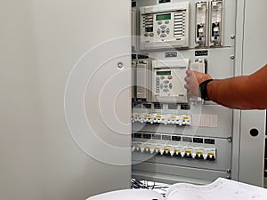 The engineer rechecks all protection relays and Metering before DC and AC voltage supply tests.