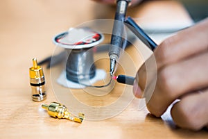 Engineer Repairing and adjustment RCA cable