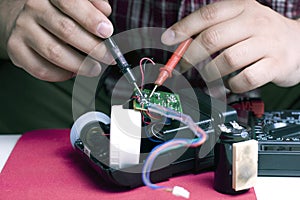 Engineer repairing a flash unit