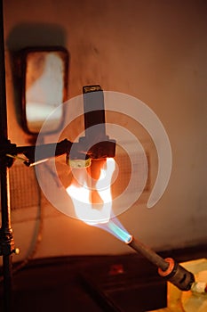 Engineer set up and testing old machine in factory