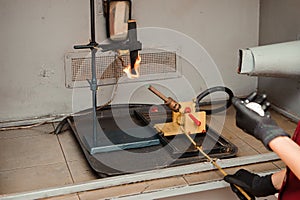 Engineer set up and testing old machine in factory