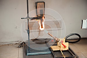 Engineer set up and testing old machine in factory, engineering and industrial concept