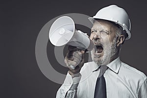 Engineer shouting into a megaphone
