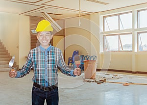 Engineer smile with hand holding triangle trowel and paint brush. in employment repair water leak drop interior office building