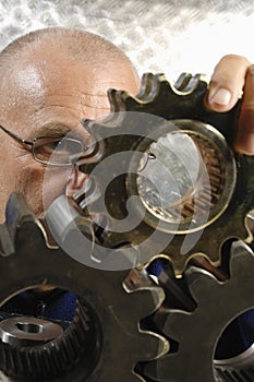 Engineer studying a gear machinery