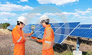 Engineer take the Thermoscanthermal image camera scan to the solar panel for a temperature check, Concept to used technology to