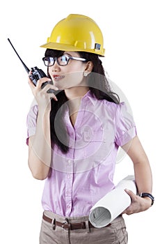 Engineer talking on the walkie-talkie