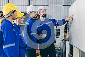 Engineer team employee plan meeting. Plant staff worker safety technician group planning process discussion with white board