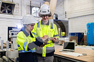 engineer team staff worker working in wooden furniture factory control operate wood cutter machine