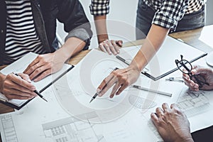 Engineer Teamwork Meeting, Drawing working on blueprint meeting for project working with partner on model building and engineering