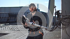 Engineer or technician checking an antennae