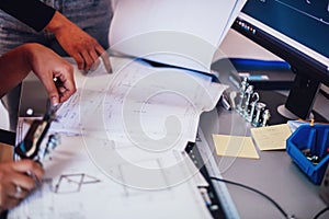 Engineer technician designing drawings mechanical parts engineering Enginemanufacturing factory Industry Industrial work