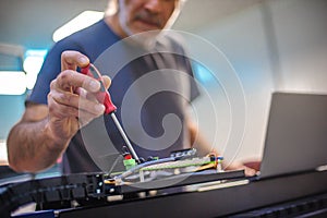 Engineer technician electrician inspect system with laptop computer. Electric installation