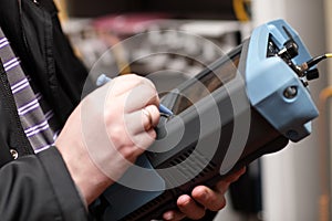 Engineer with telecom analyzer