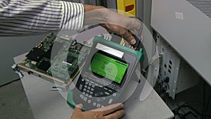 IT engineer test and maintenance telecom equipment in server room, datacenter