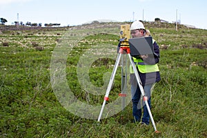 Engineer with theodolite