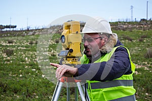 Engineer with theodolite