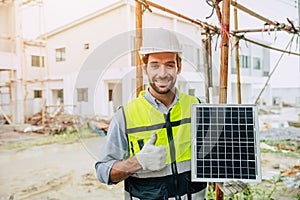 Engineer thumbs up happy with Solar panel for saving energy recommend for modern home construction