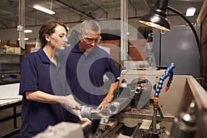 Engineer Training Female Apprentice On Milling Machine