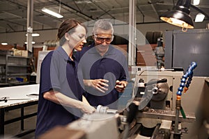 Engineer Training Female Apprentice On Milling Machine