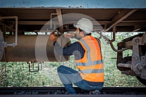 Engineer under discussion inspection and checking construction process railway switch and checking work on railroad station .Engin