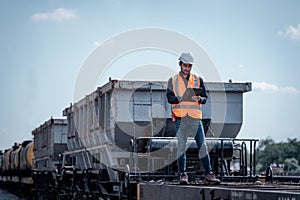 Engineer under discussion inspection and checking construction process railway switch and checking work on railroad station .Engin