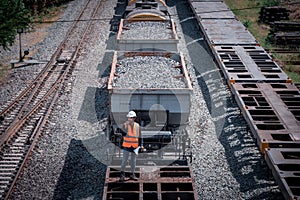 Engineer under discussion inspection and checking construction process railway switch and checking work on railroad station .Engin