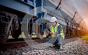 Engineer under discussion inspection and checking construction process railway switch and checking work on railroad station .Engin