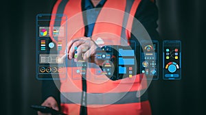 Engineer using augmented reality interface to analyze construction data. Smart industry technology concept with futuristic digital