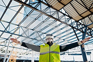 Engineer using virtual reality to inspect building progress.