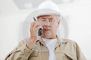 engineer using walki talkie