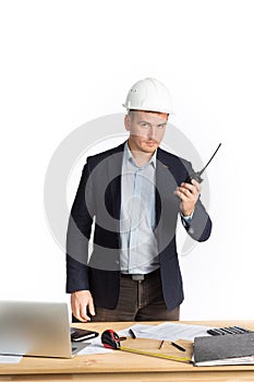 Engineer using walkie talkie. isolated on white.