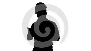 Engineer walking and using smartphone, Alpha Channel