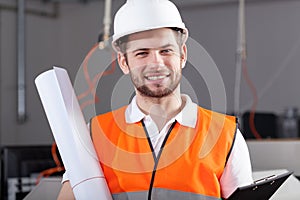 Engineer in warehouse with project