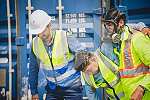 Engineer wear PPE urgently assisted the male technique inside container as Chemical spill in the container shipping industry