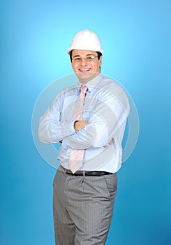 An engineer with white hard hat
