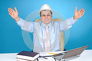 An engineer with white hard hat at work