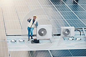 Engineer woman, solar panel and thumbs up with smile for clean power, sustainability or success on roof. Technician