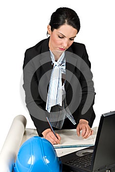 Engineer woman work in office and drawing plans