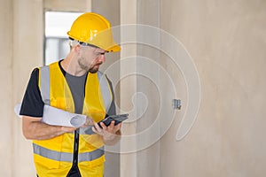 Engineer worker builder contractor work in construction site for building inspector QC job checking detail project progress
