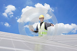 Engineer worker installing solar panels outdoors