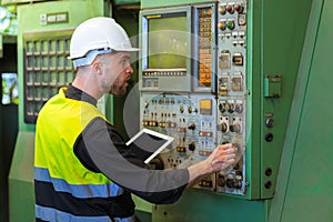 engineer worker using digital tablet for checking in factory