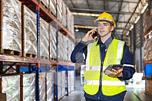 engineer worker using smartphone phone calling people in factory store warehouse