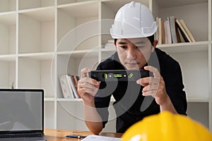 Engineer working on construction level planning Concept