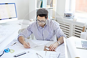 Engineer Working at Desk