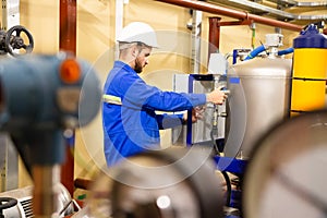 Engineer working inside oil and gas refinery