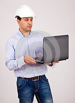 Engineer working in a laptop