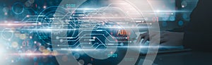 Engineer working on a laptop, utilizing advanced AI technology for data processing. Concept of AI-driven tech control, showcasing