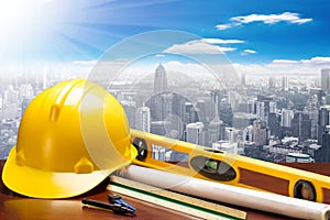 Engineer working table plan and blueprints at building construct