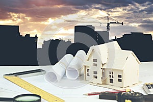 Engineer working table plan, home model and writing tool equipment